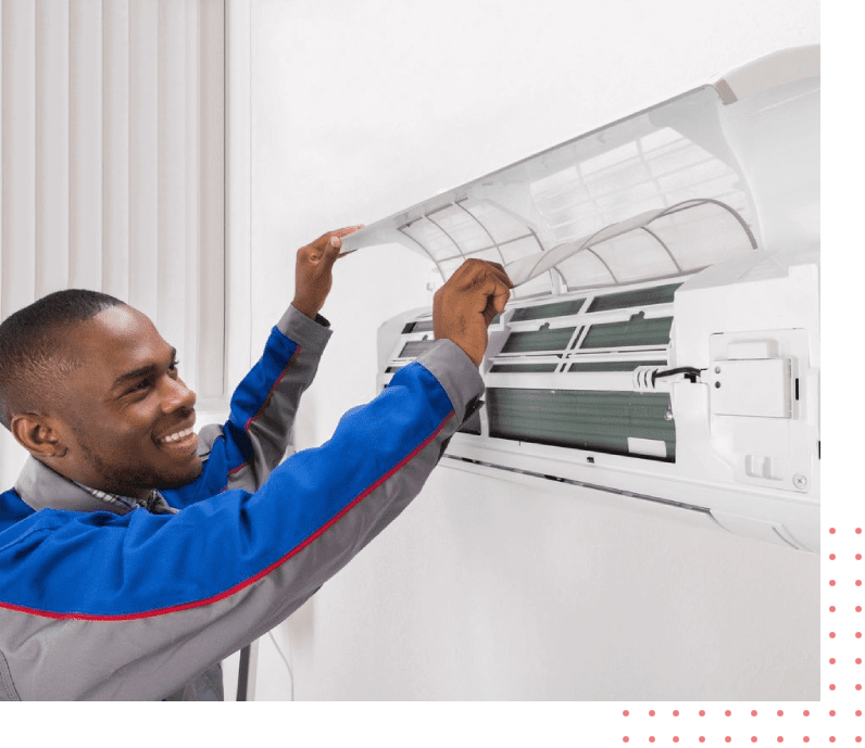 A man is fixing the air conditioner